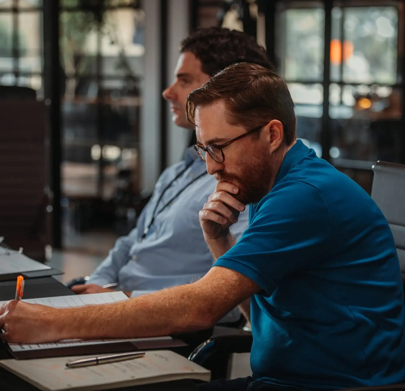 Two colleagues reviewing marketing and sales performance together